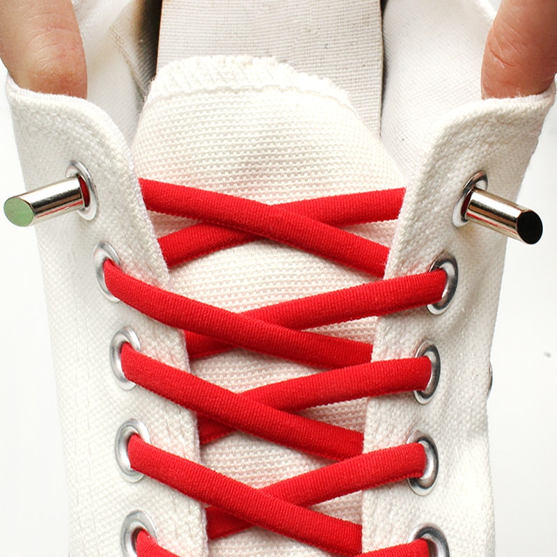 Oval elasticated shoelaces with metal ends